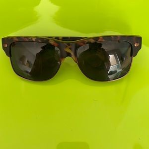 Solar Shield polarized lens tortoise frame.